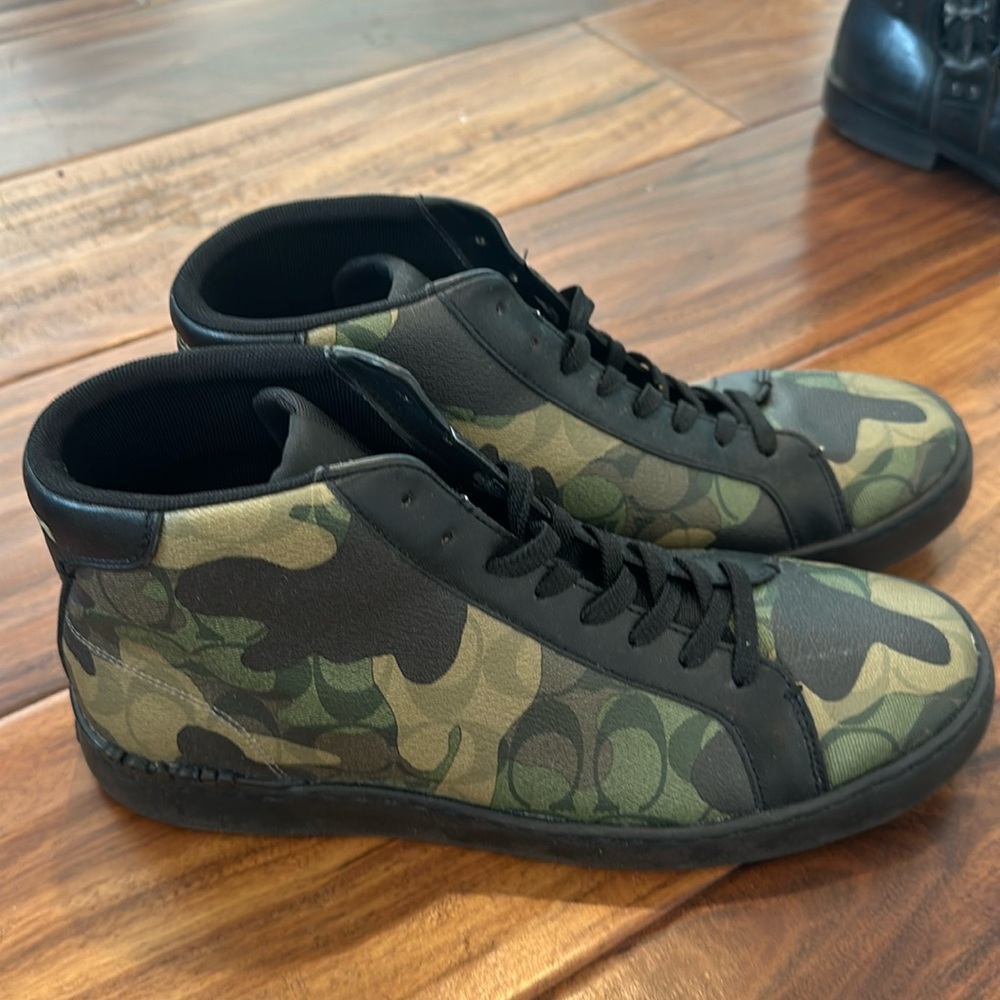 Coach Camo high top sneakers.